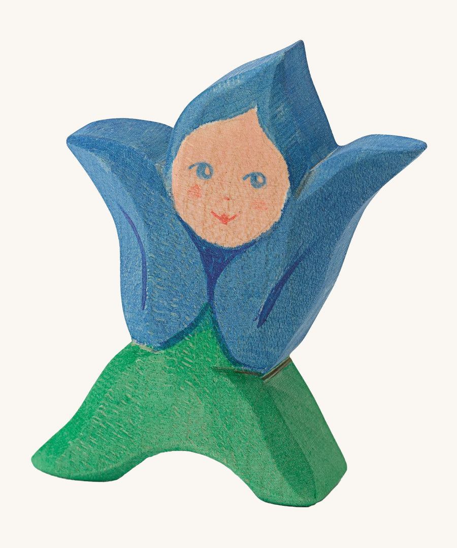 Ostheimer Wooden Flower Child Gentian. Handmade and crafted flower child in a blue painted tulip designed cape and green dress