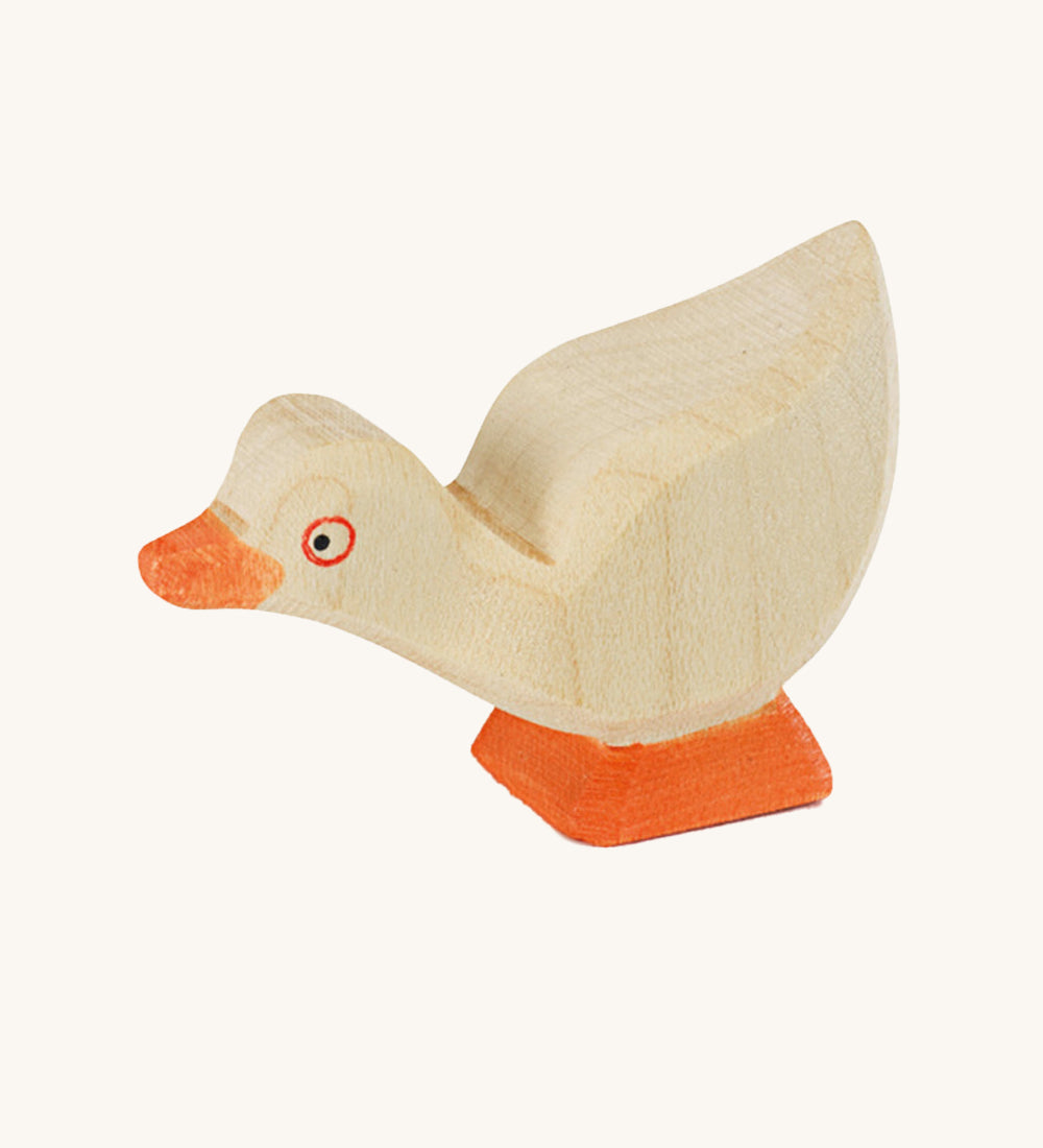 A beautifully hand crafted and hand painted Gosling in white, with an orange beak and orange feet