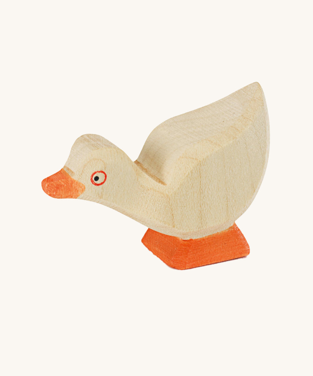 A beautifully hand crafted and hand painted Gosling in white, with an orange beak and orange feet