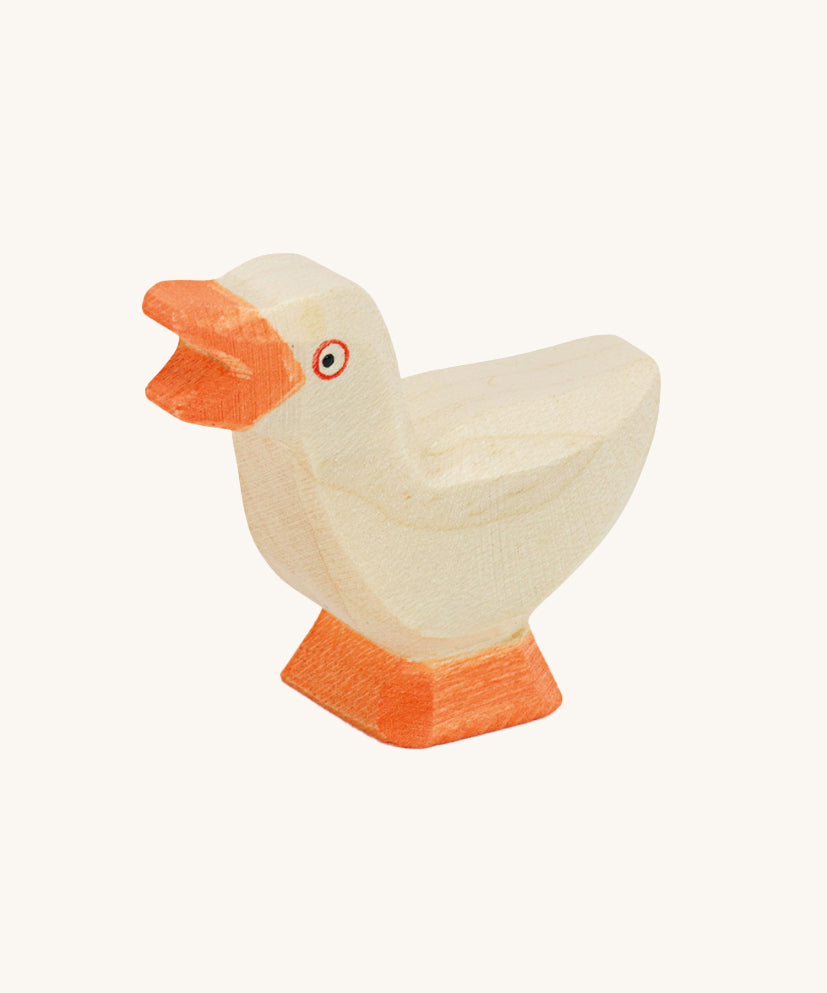 A beautiful hand crafted and hand painted gosling, in white with an orange beak and orange feet