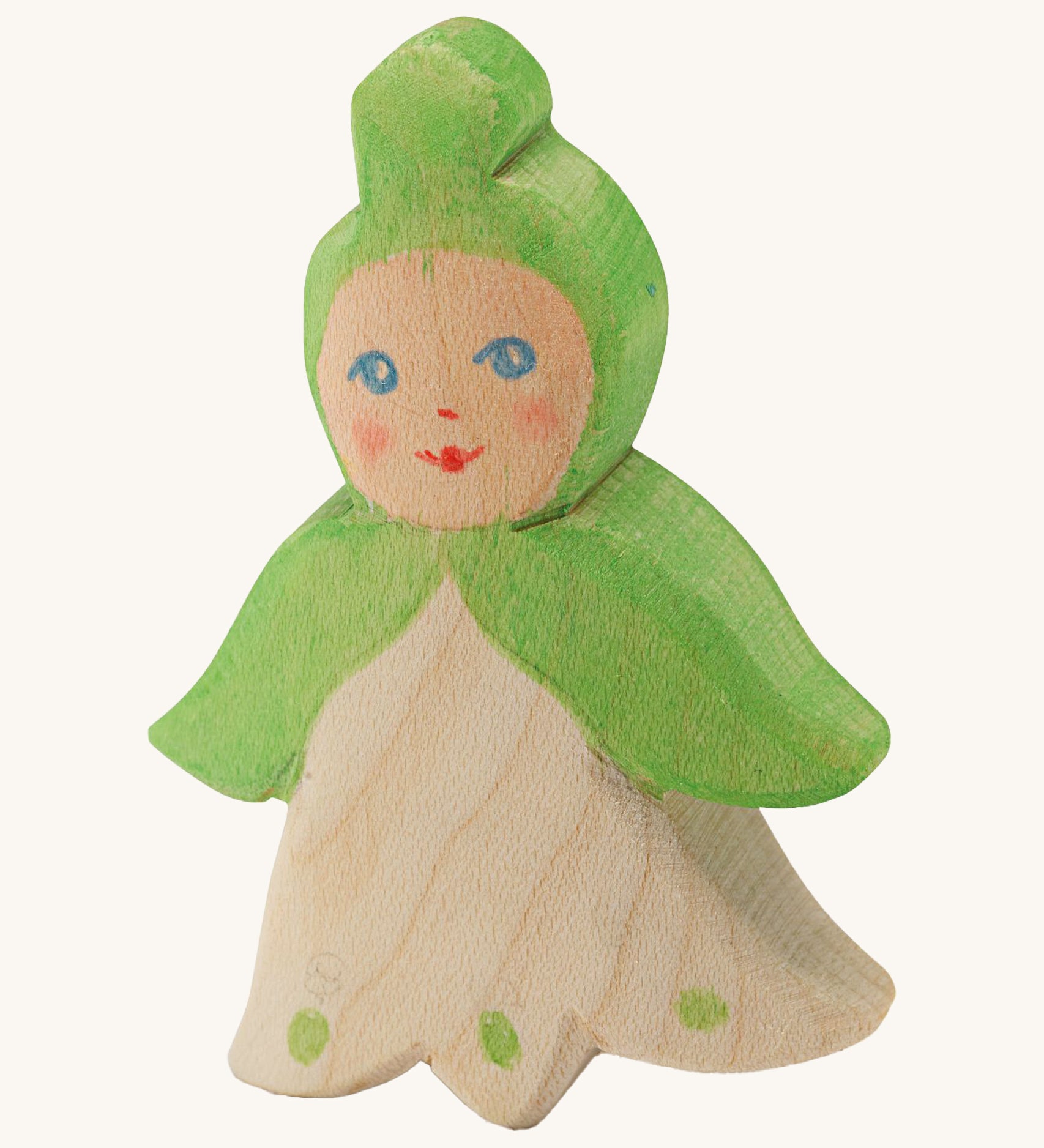 Ostheimer Wooden Flower Child Snowflake. Handmade and crafted flower child in a green cape