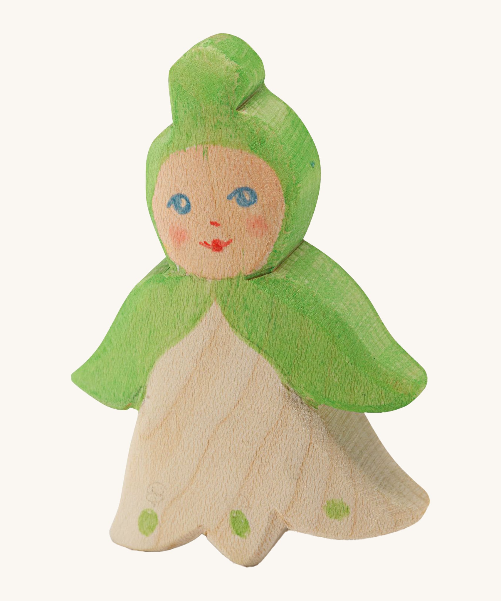 Ostheimer Wooden Flower Child Snowflake. Handmade and crafted flower child in a green cape