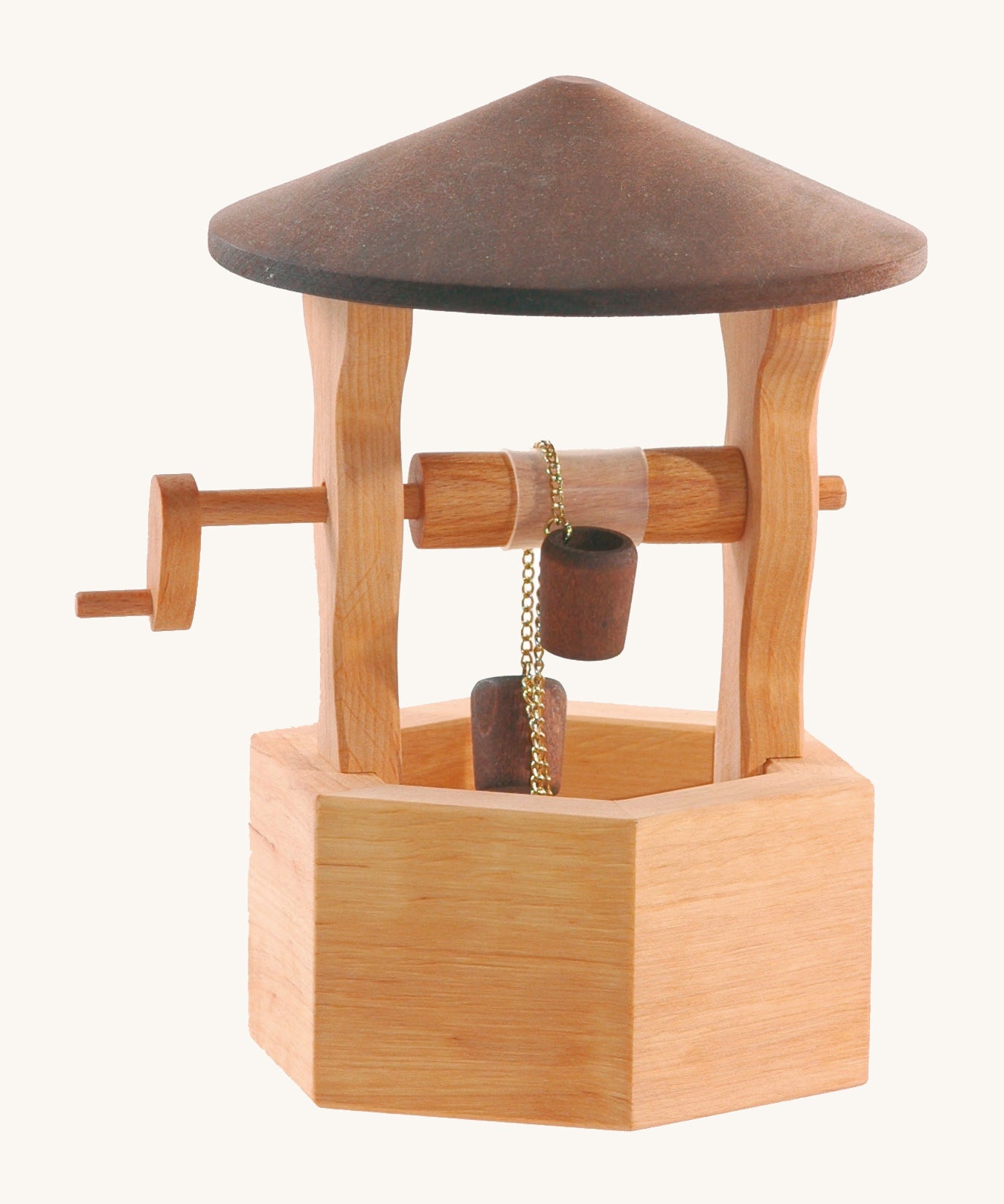 Ostheimer handmade, wooden wishing well with a dark brown wooden roof. This wishing well has a moving handle which pulls two small wooden buckets up and down on a gold metal chain