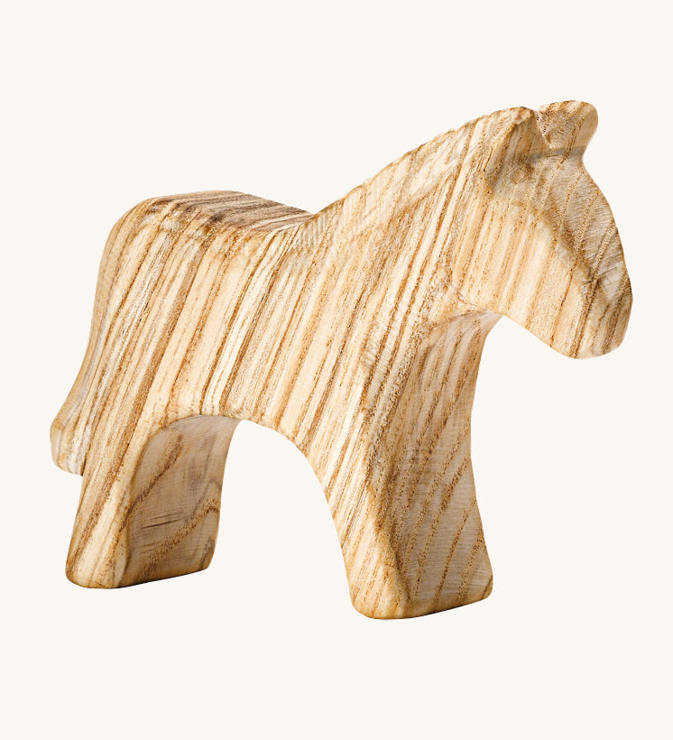 A beautifully hand crafted wooden horse figure, showing the beautiful natural wood grain