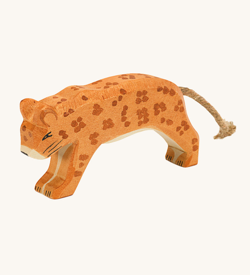 Ostheimer Wooden, handmade and hand painted Leopard. This leopard is painted orange with light brown spots, and a natural cord tail