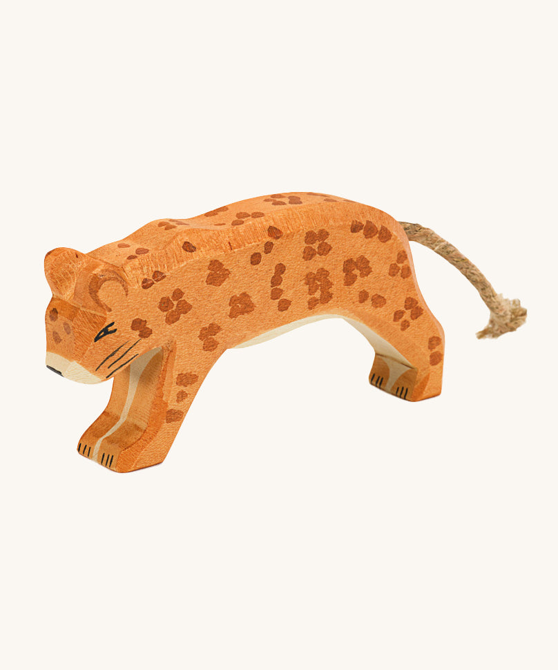 Ostheimer Wooden, handmade and hand painted Leopard. This leopard is painted orange with light brown spots, and a natural cord tail