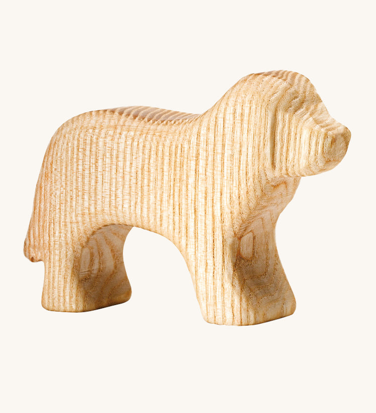 Ostheimer Natural Dog. A beautiful, hand made natural wooden dog, which is showing the natural wood grain of the tree it was made from