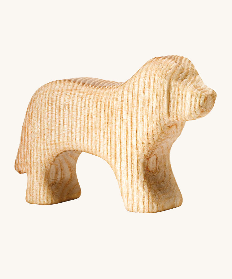 Ostheimer Natural Dog. A beautiful, hand made natural wooden dog, which is showing the natural wood grain of the tree it was made from