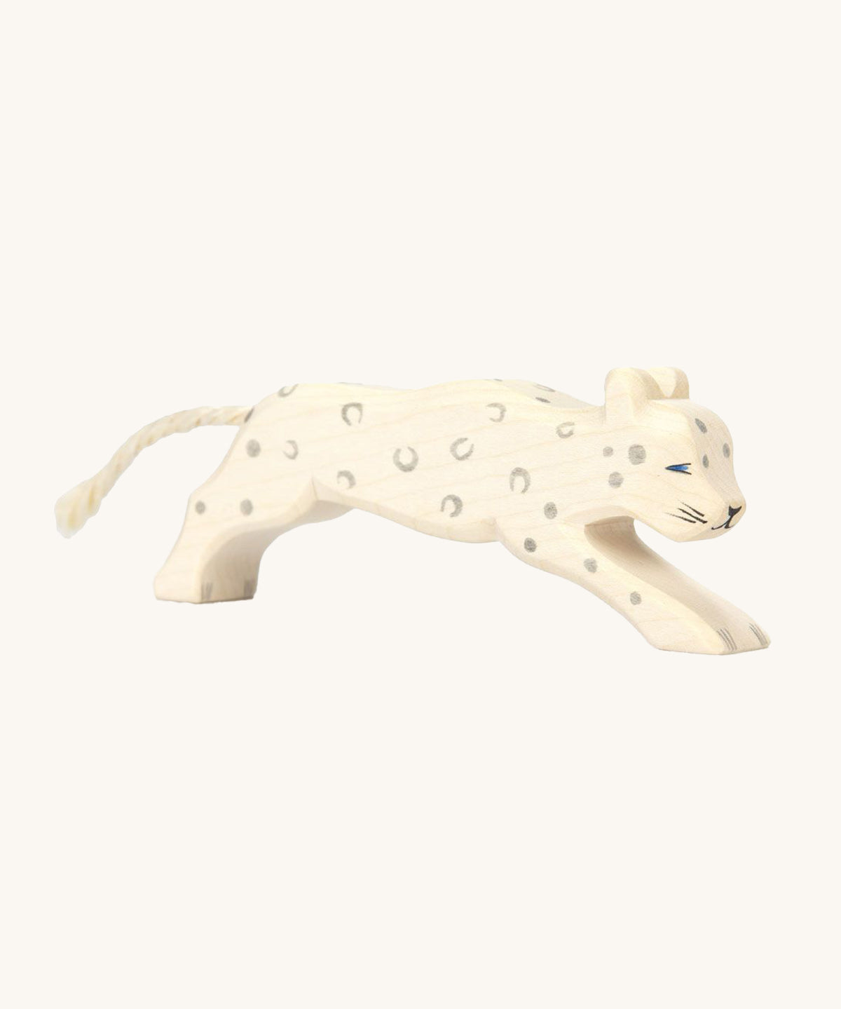 A beautifully hand crafted and hand painted Snow Leopard toy, in white with grey spots, blue eyes and a cord tail