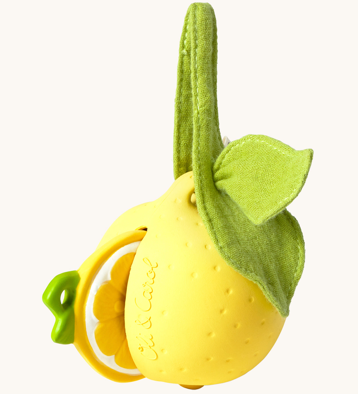 The Lou the Lemon Pacifier Holder on a cream background. The image shows an Oli & Carol lemon teething toy half way inside the holder. The lemon is textured and has a green muslin leaf attachment on the top to tie the holder to a pram handle, high chair etc.