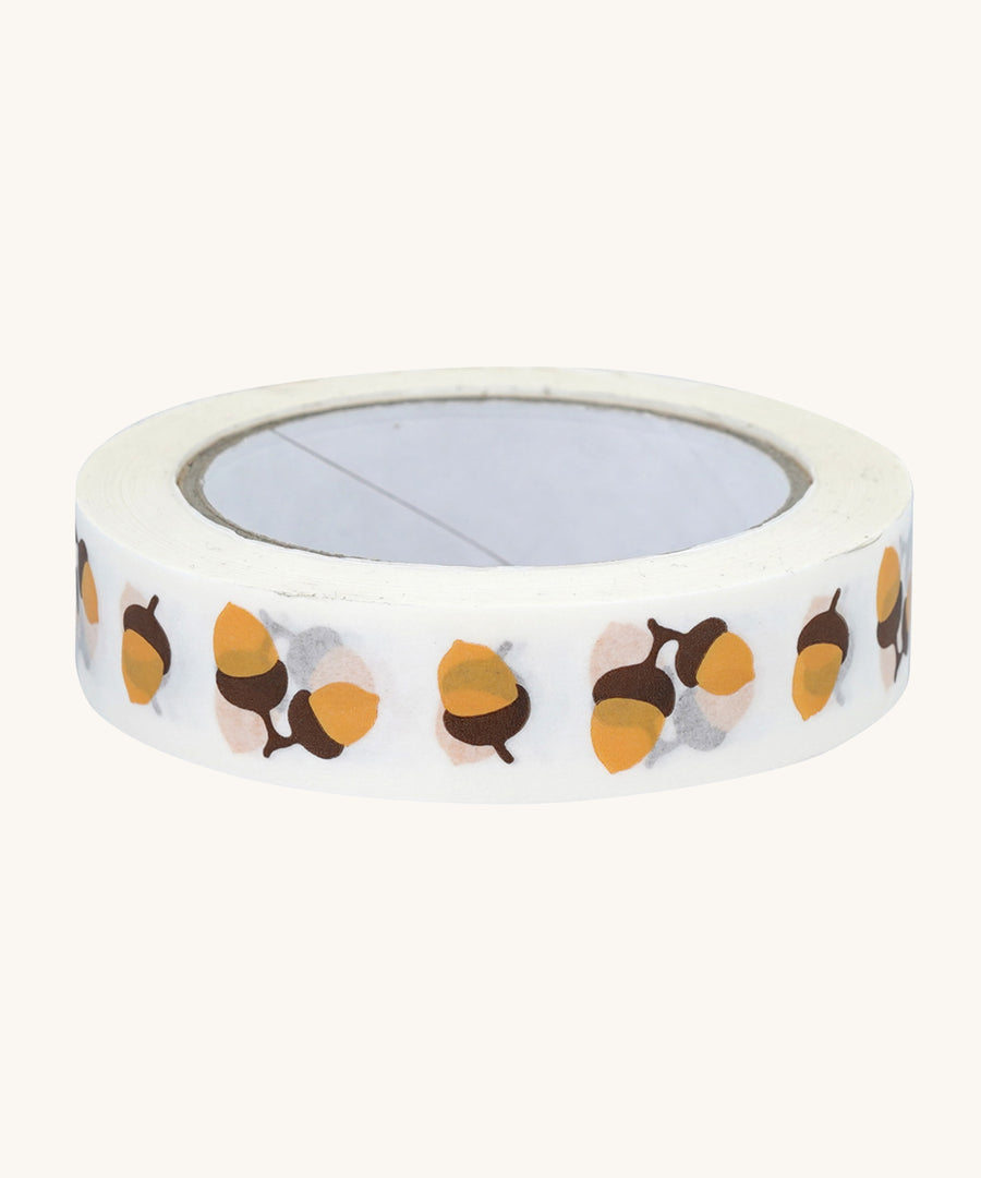 Babipur Acorn Eco Paper Tape in white, with a repeat acorn print. On a cream backgorund