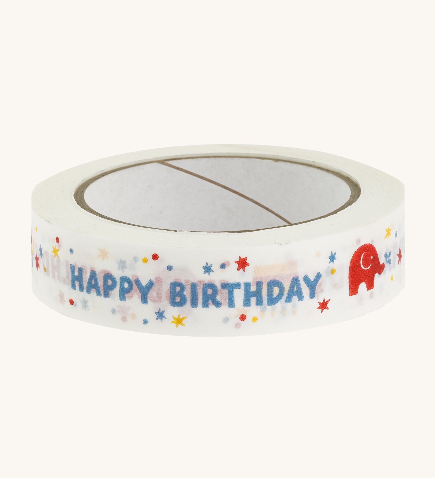 Happy birthday paper tape on a cream background.