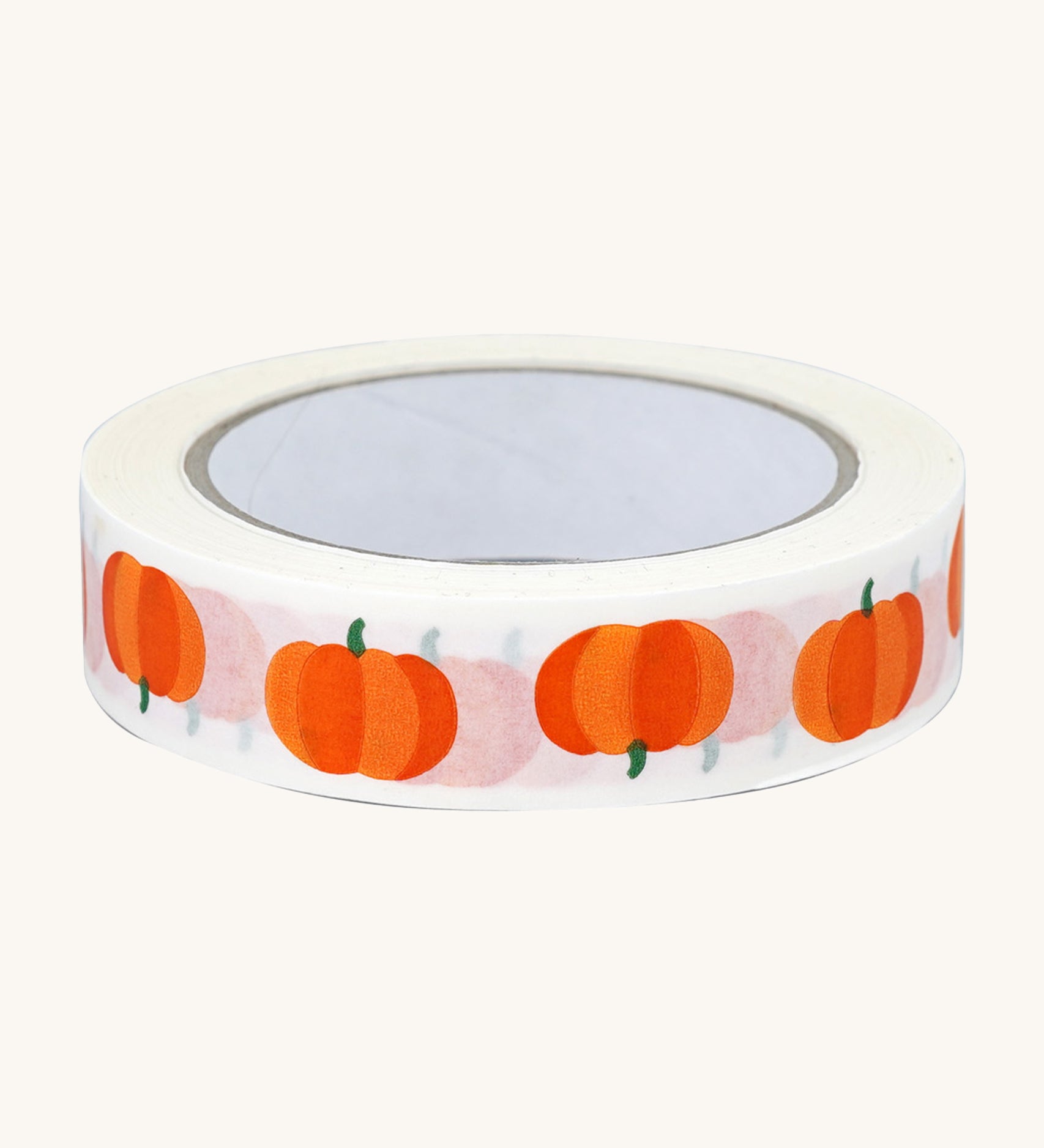 Babipur Pumpkin Eco Paper Tape in white, with orange pumpkin repeat pattern. On a cream background