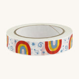 Paper tape with rainbows and stars on a cream background.