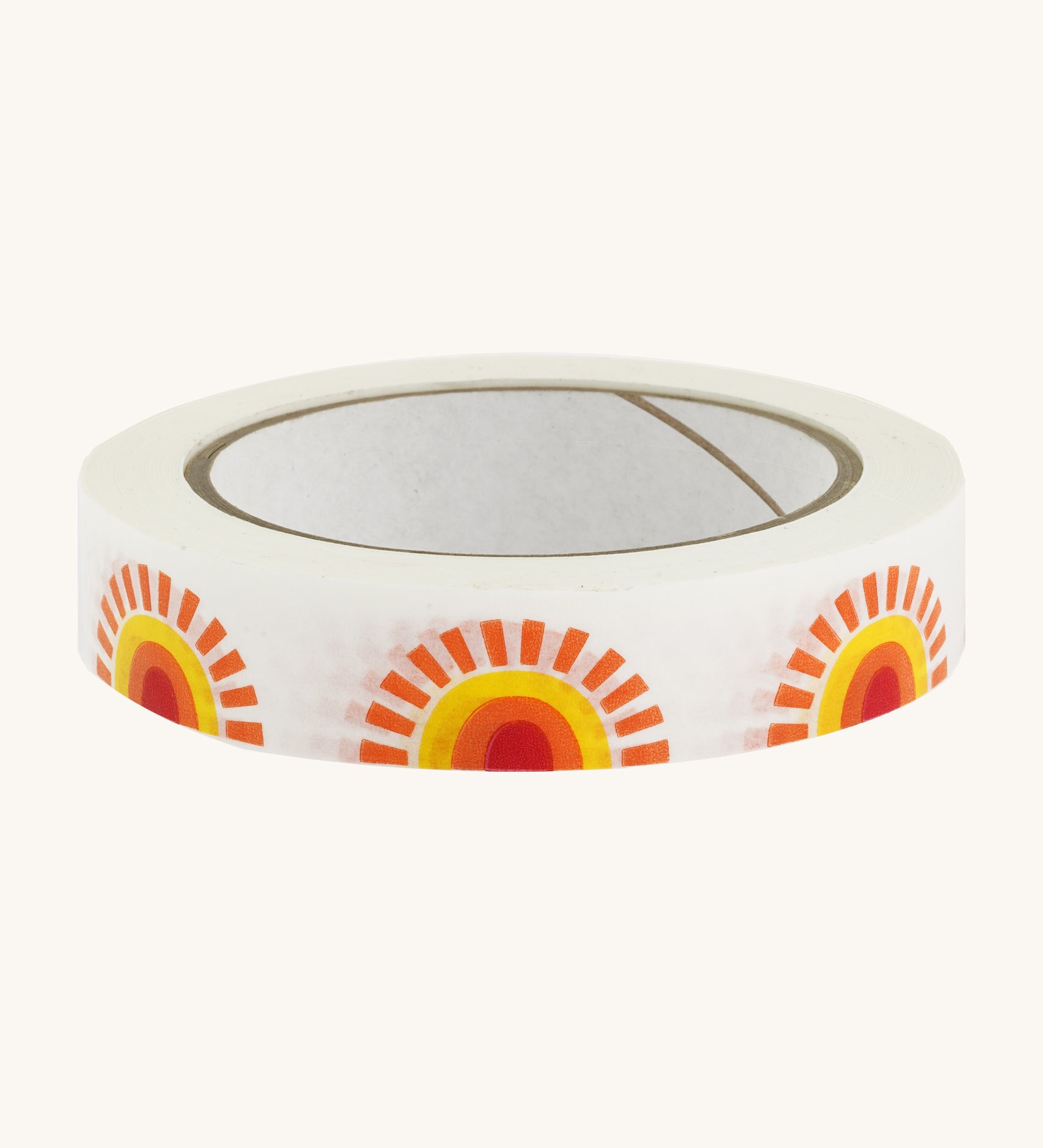 Paper tape with sunshine design on cream background.