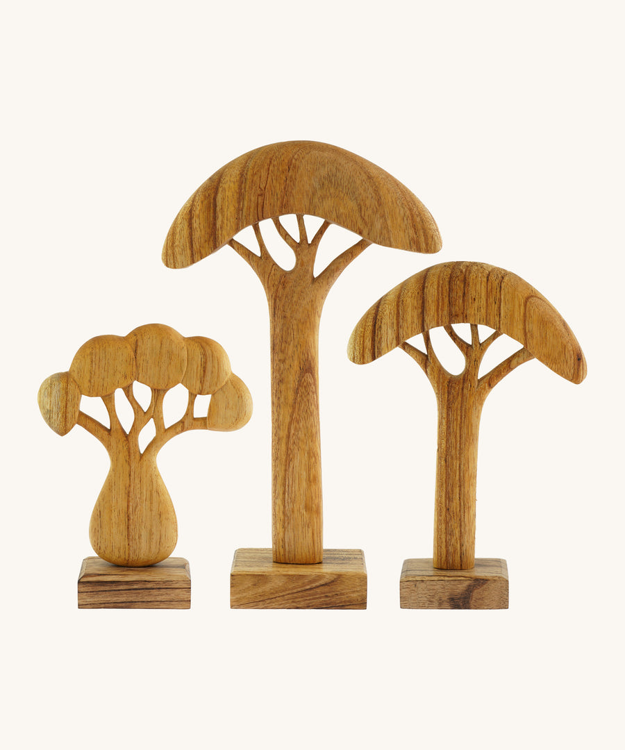 A set of 3 natural Papoose African trees on a cream background