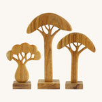 A set of 3 natural Papoose African trees on a cream background