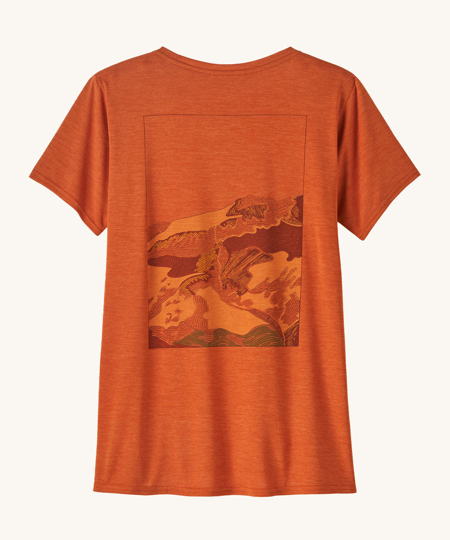 Patagonia Women's Cap Cool Daily Graphic Shirt - Lands Redtail Rust. An orange rust coloured, short sleeve t-shirt with a muted mountain side print