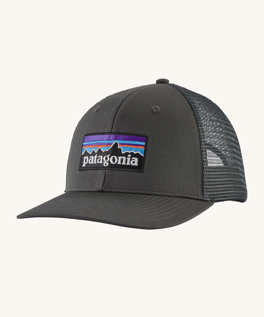 Patagonia P-6 Logo Trucker Hat - Forge Grey. A recycled material trucker hat, with an organic cotton peak, with a Patagonia mountain range logo on the front of the cap and mesh at the back