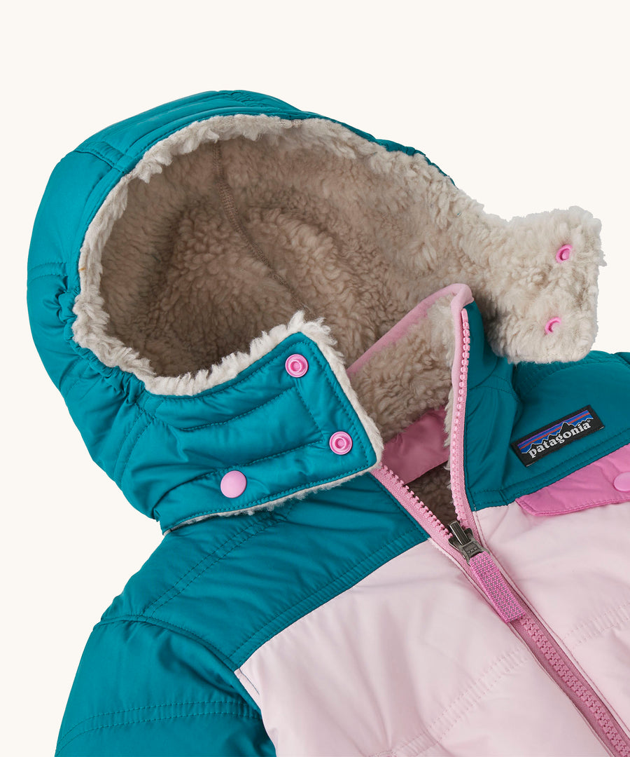 A closer look at the fleece lined, removable hood on the Patagonia Baby Reversible Tribbles Hoody 