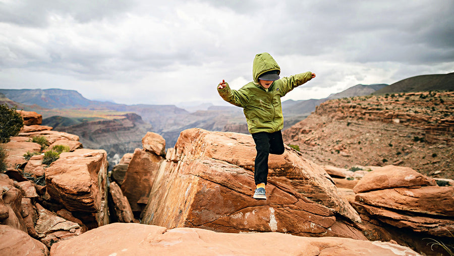 A child on an adventure wearing a Patagonia coat