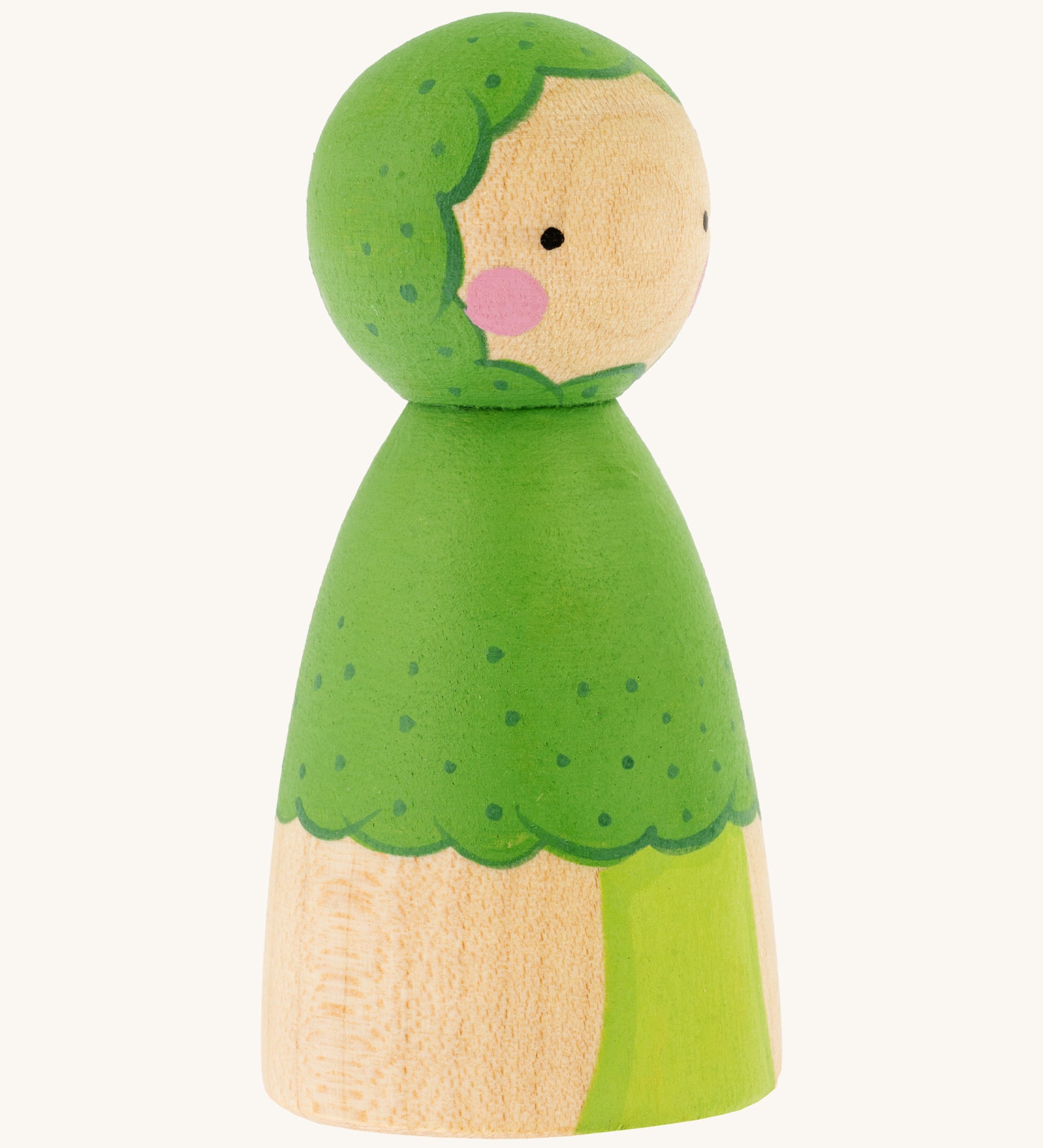 The side of the Peepul Broccoli Peg Doll, is a beautiful, hand painted peg doll with a green broccoli stem and floret body, a green painted broccoli  hood. The image is on a cream background