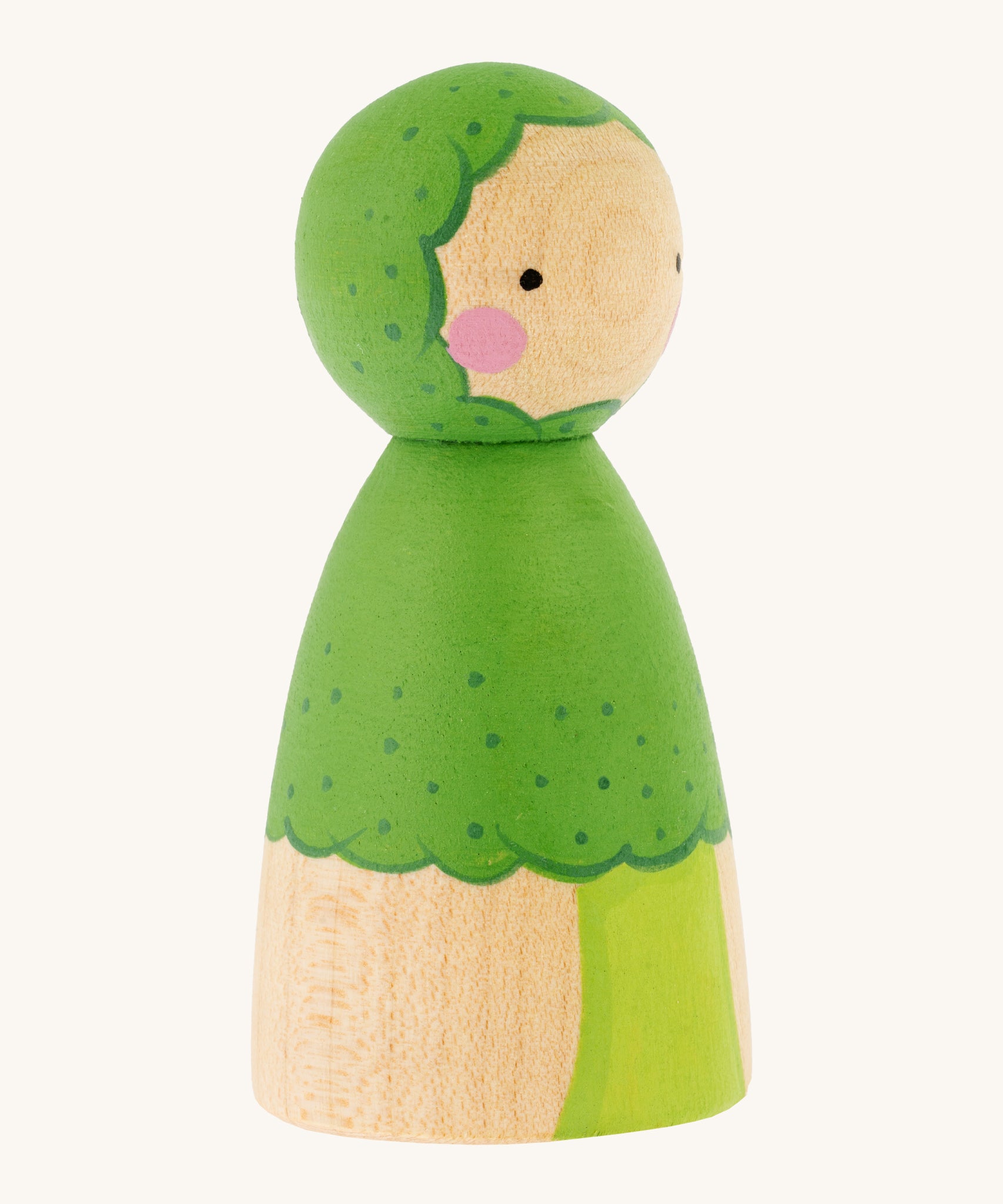 The side of the Peepul Broccoli Peg Doll, is a beautiful, hand painted peg doll with a green broccoli stem and floret body, a green painted broccoli  hood. The image is on a cream background