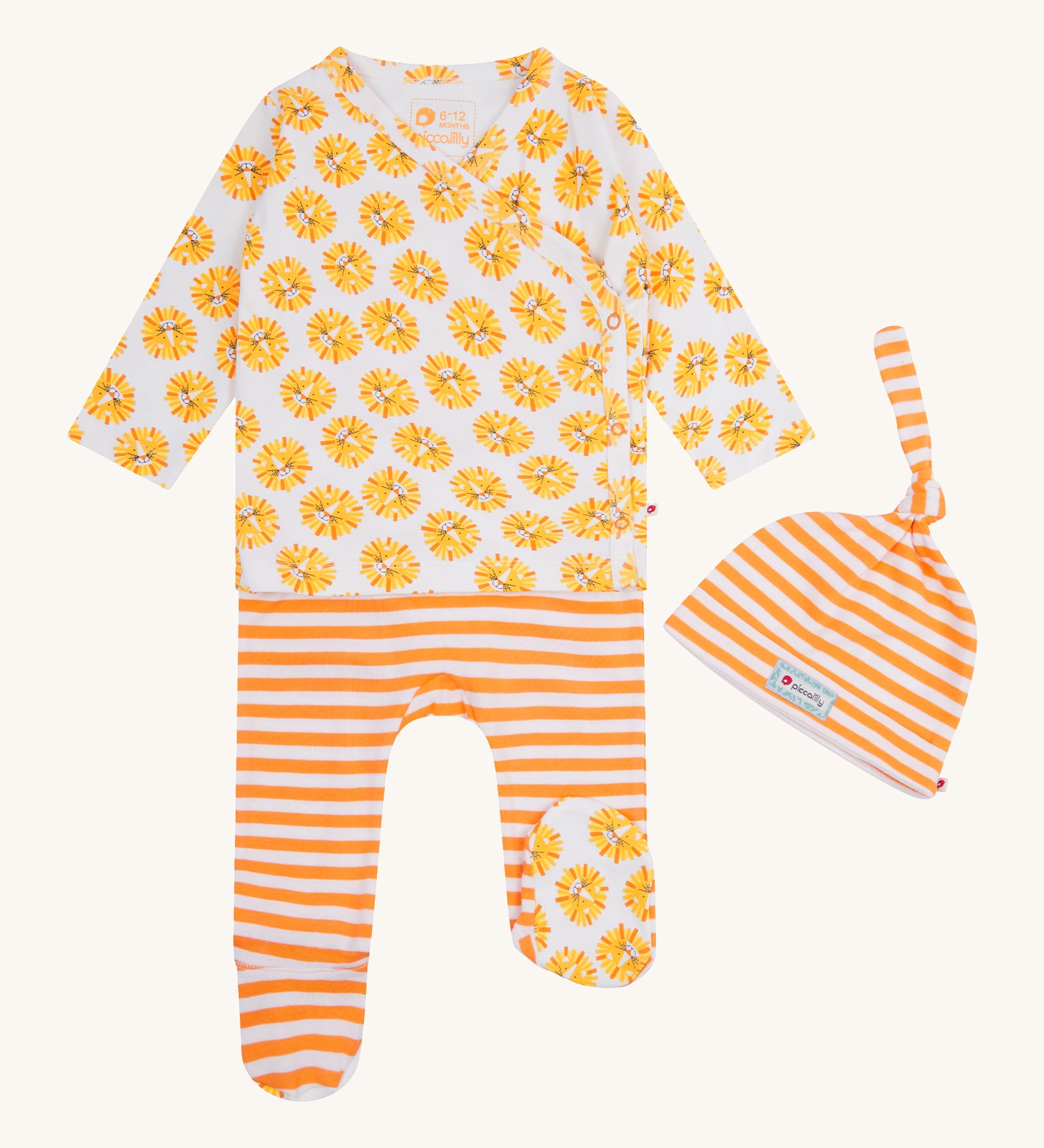 Piccalilly Lion 3 Piece Baby Set. Inclues a wrap around top with a cheerful lion print. Footed trousers with orange and white stripes, and a cheerful lion print footing. And an orange and white stripe hat