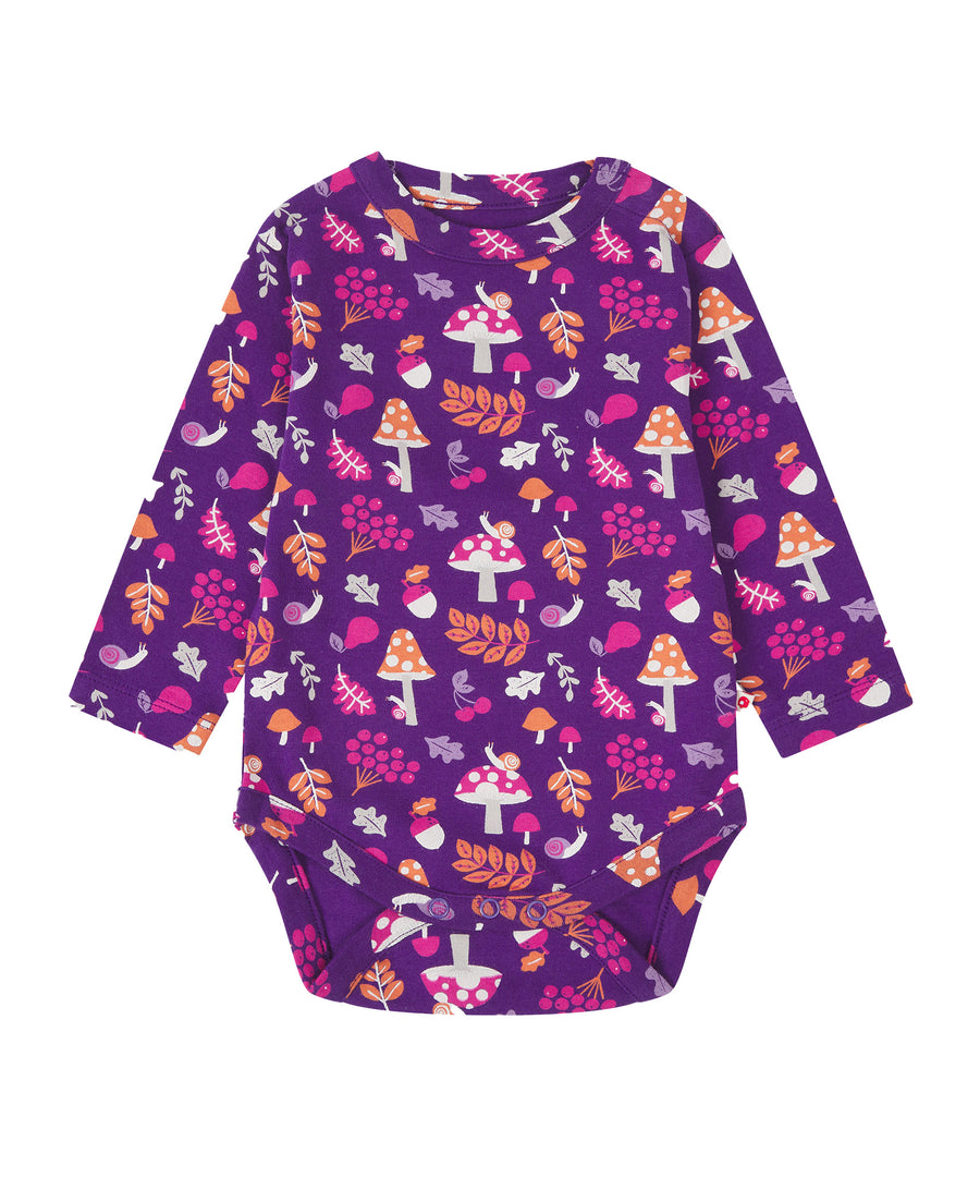 A fun Woodland print consisting of mushroom, snails, cherries and leaves on a purple fabric