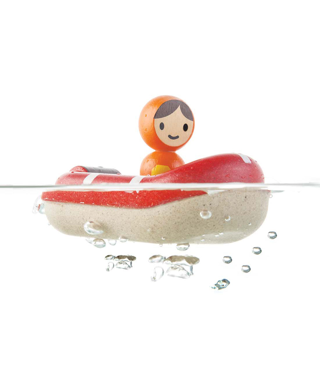 The PlanToys Coast Guard Boat Bath Toy floating on water on a white background