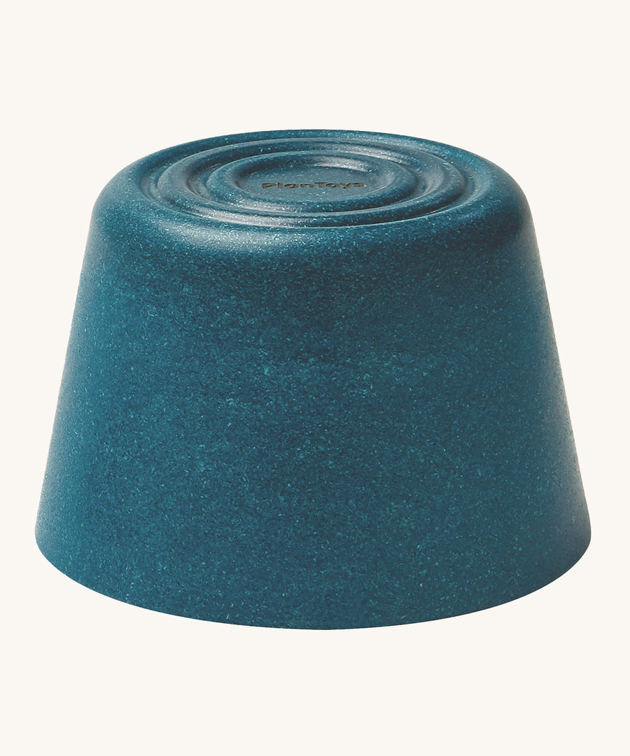 The blue block from the PlanToys Creative Sand Play set, with a textured top for sensory play 