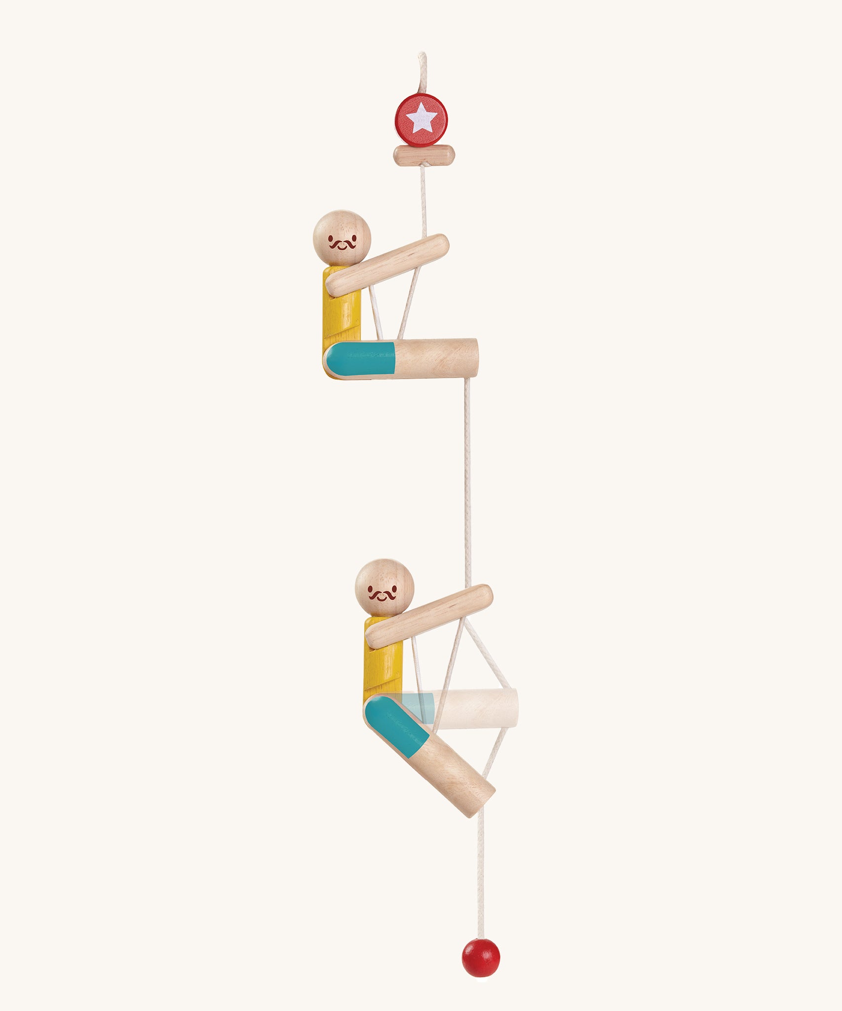 This image shows how the wooden figure Acrobat climbs up the rope by pulling on the string, on a cream background