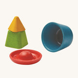 PlanToys Creative Sand Play set comes with 4 PlanWood pieces which are a yellow trianlge block, a green square block, a red disk block and a blue bowl block. Each block is hollow to all for sand or messy play building, or collecting treasures. The red and yellow piece have holes to allow for water to be poured through.