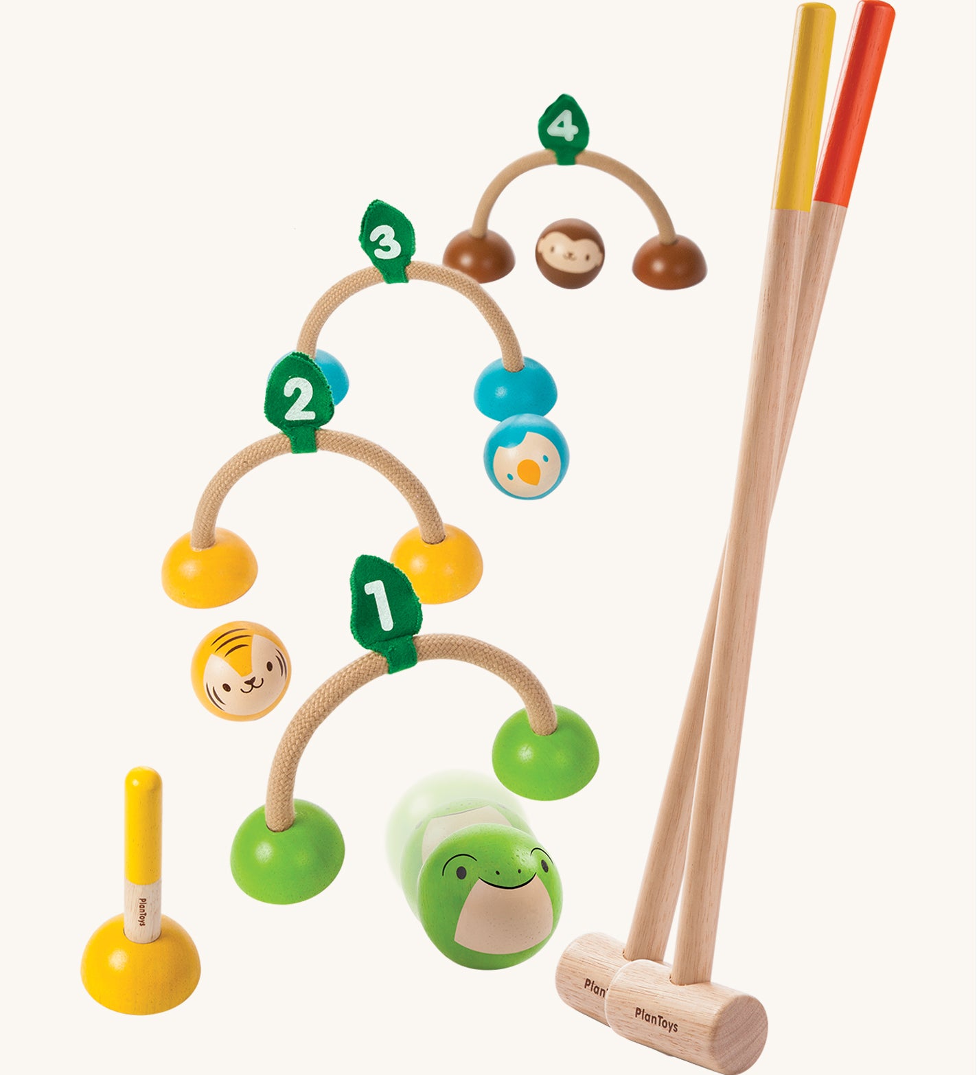 PlanToys Croquet is a fun and colourful game of skill, but can also be used as a colour match and counting game. The set comes with two wooden rackets, 4 balls that each have a face of an animal (monkey, penguin, tiger and frog), and 4 semi circle, rope hoops each with a number 1 to 4 on top, for the ball to go through. The image is on a cream background