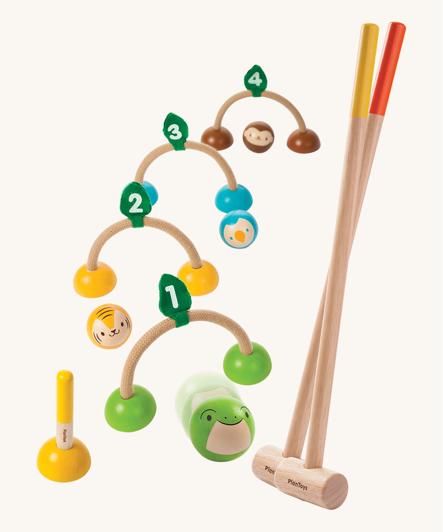 PlanToys Croquet is a fun and colourful game of skill, but can also be used as a colour match and counting game. The set comes with two wooden rackets, 4 balls that each have a face of an animal (monkey, penguin, tiger and frog), and 4 semi circle, rope hoops each with a number 1 to 4 on top, for the ball to go through. The image is on a cream background