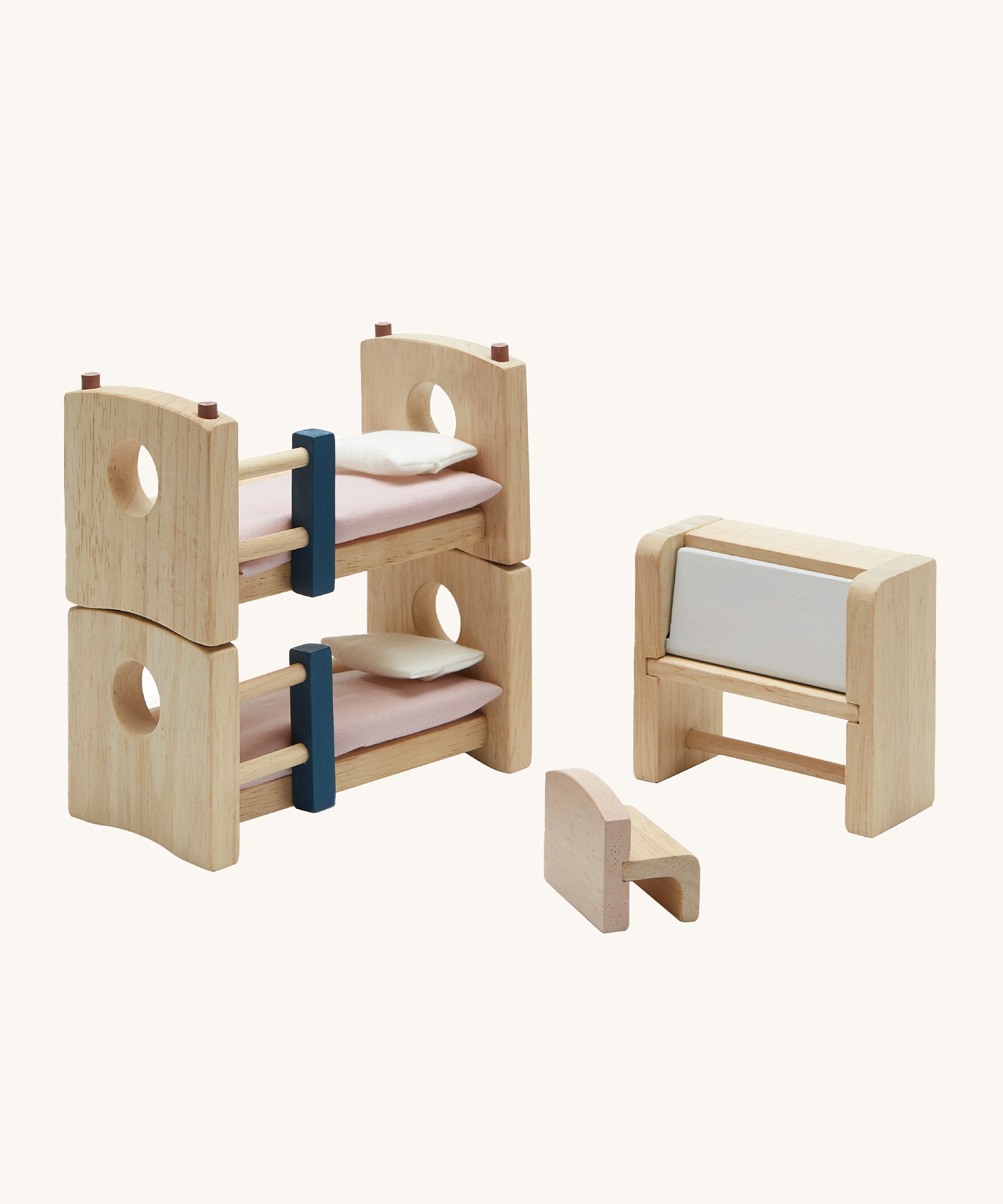 PlanToys Children's Room Dolls House Furniture come with a bunk bead, a chair and a fold out desk. On a cream background