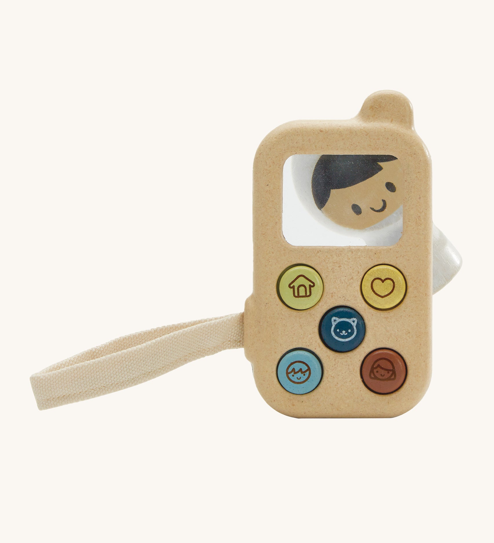 PlanToys Baby's First Phone toy, offers a fun and sensory experience for little ones. This toy is made from wood and has 5 buttons on the front with friendly images. There is also a magnifying glass square so little ones can explore their surroundings in more detail. The image is on a cream background