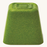 The green block from the PlanToys Creative Sand Play set, with a textured top for sensory play