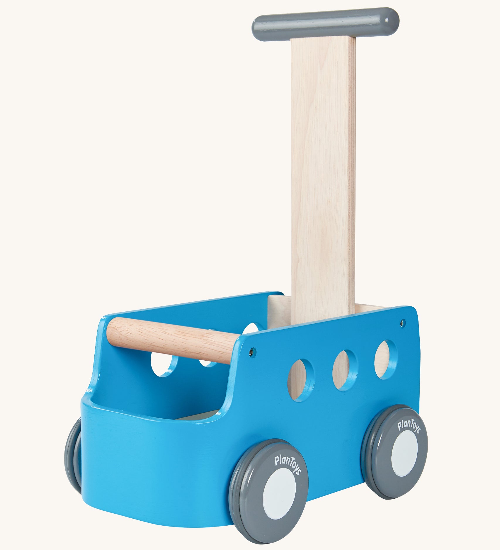 The PlanToys Blue Van Walker is a 2 in 1 toy as a walker and a storage toy box. The van is blue with grey wheels which have "PlanToys" painted onto them, a grey handle with a natural wood section connecting the handle to the van. The image is on a cream background