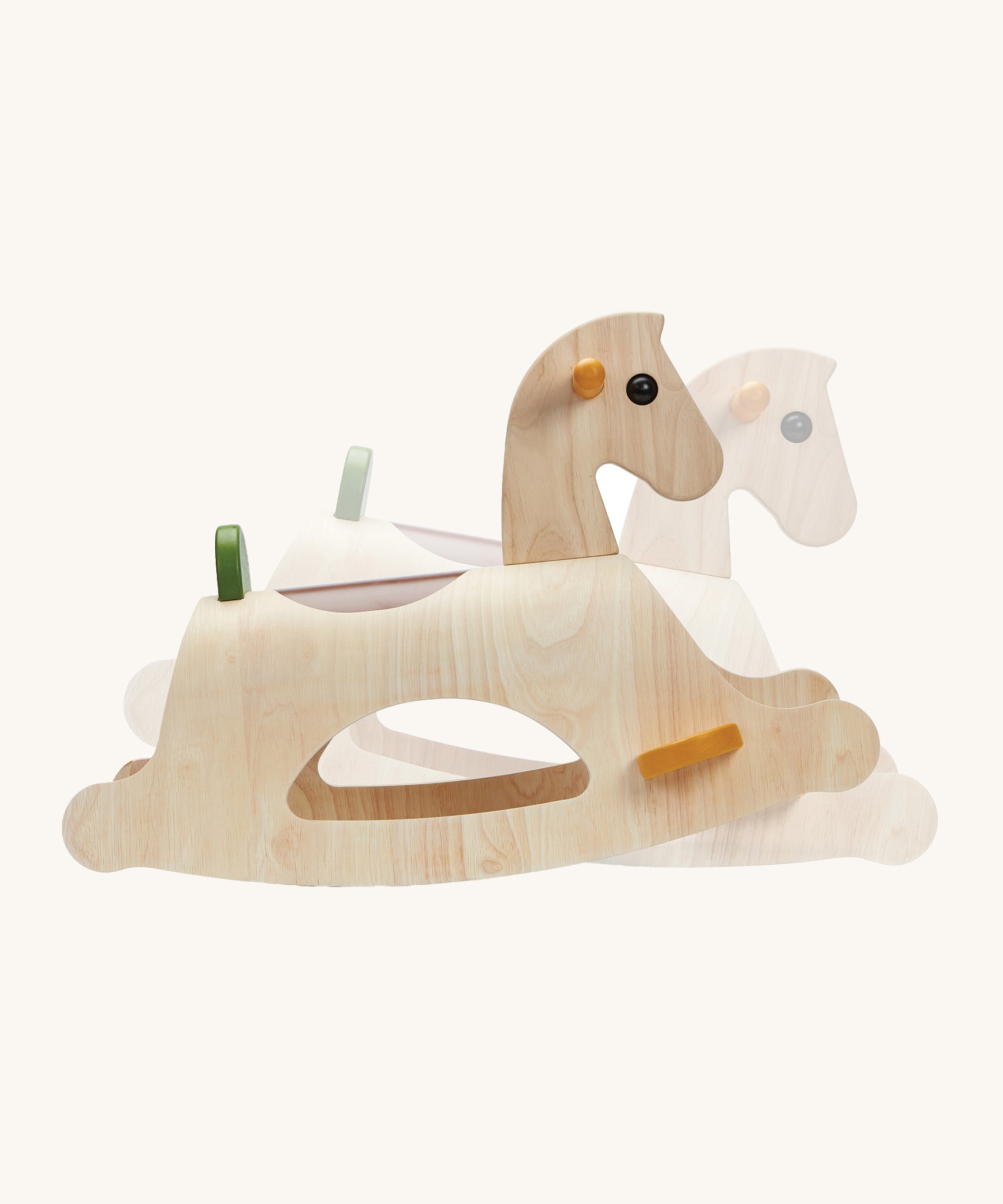 The PlanToys Palomino Rocking Horse rocking back and forth on a cream background