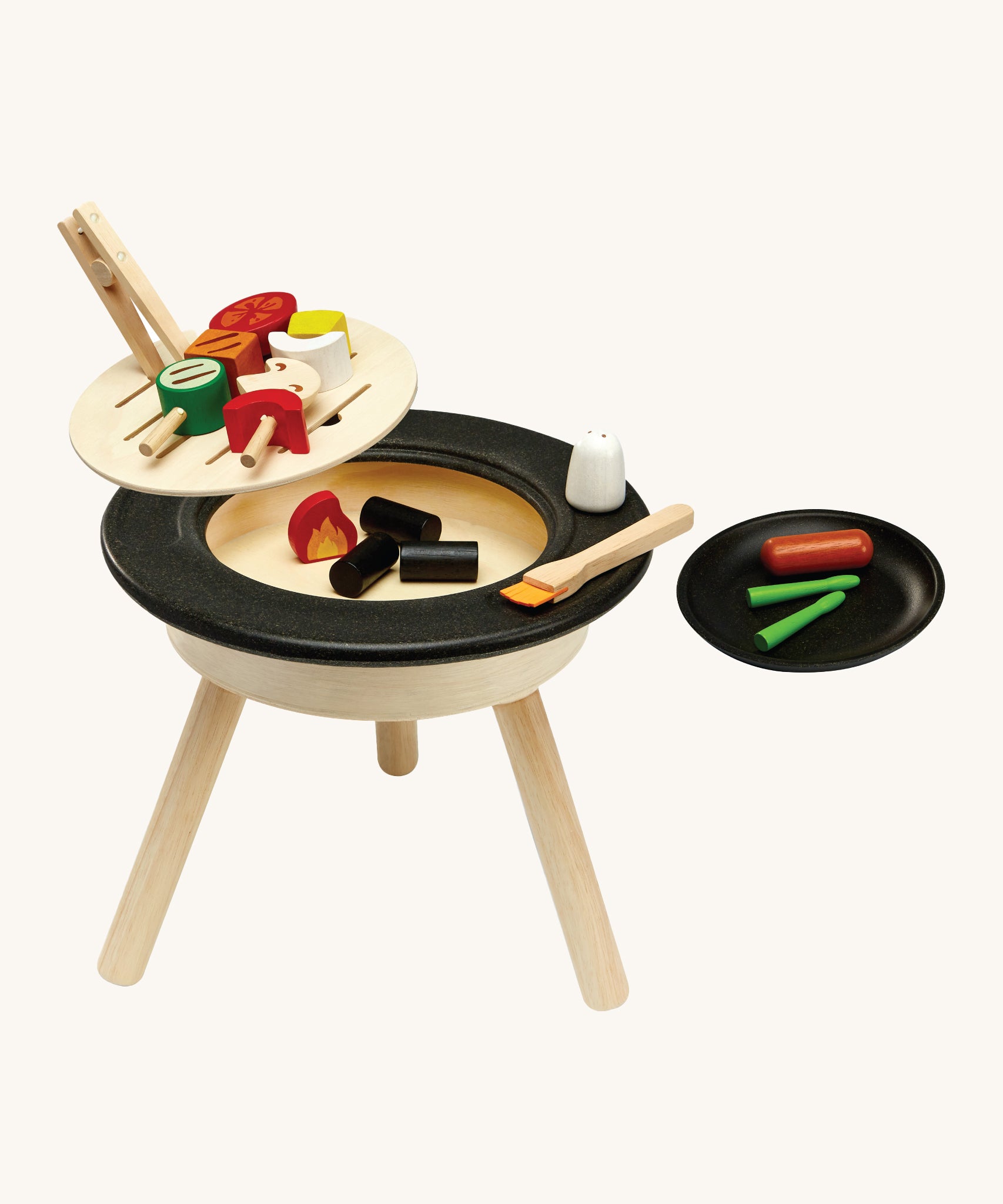 The PlanToys BBQ Playset has a removable BBQ grill to add play coal blocks and a play fire block underneath, to give a realistic play experience