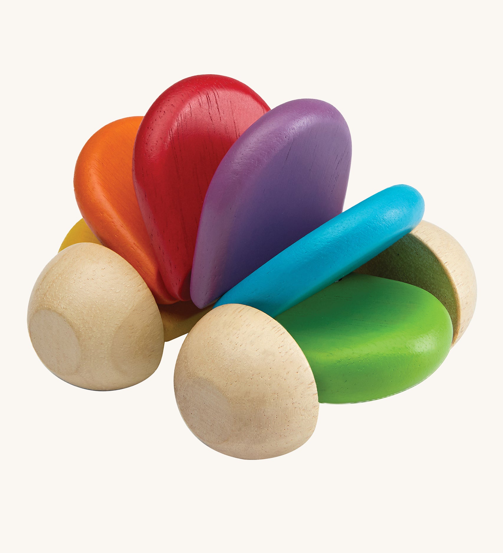 The PlanToys Car Rattle is a fun, push and pull, sensory wooden car which is perfect for babies and toddlers. When pushed along the ground, the bright rainbow coloured pieces (in green, blue, purple, red, orange and yellow) in the middle create a soft clacking sound. The image is on a cream background