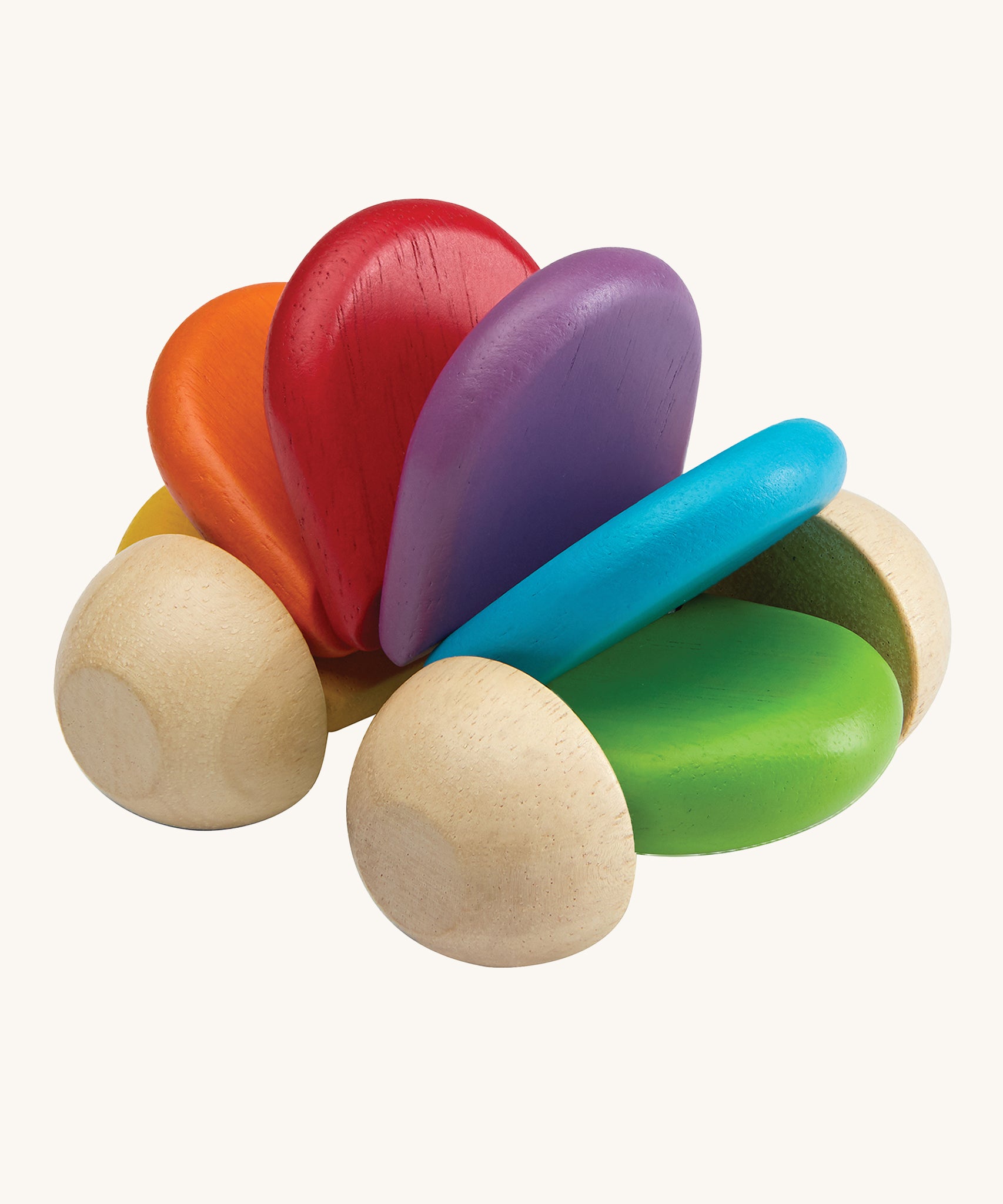 The PlanToys Car Rattle is a fun, push and pull, sensory wooden car which is perfect for babies and toddlers. When pushed along the ground, the bright rainbow coloured pieces (in green, blue, purple, red, orange and yellow) in the middle create a soft clacking sound. The image is on a cream background