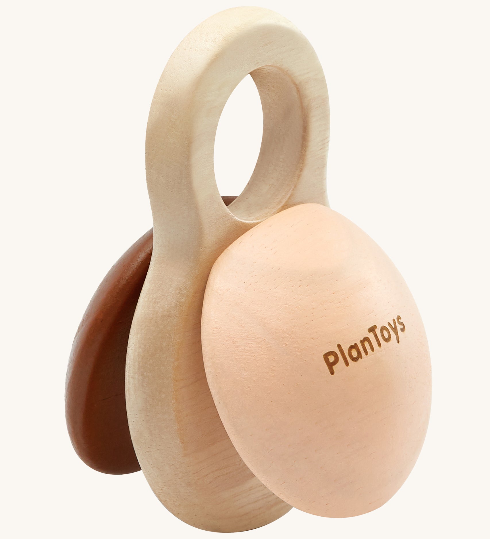 PlanToys Shake N Clap, wooden baby rattle toy offers a fun sensory experience for little ones. the clapper sides are in brown and beige, and the middle part is in natural wood with a hole in the top for easy gripping for little hands. The image is on a cream background