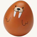 The PlanToys wooden wobbly walrus baby toy is an adorable wobble toy which babies and little ones will have so much fun playing with. The egg shaped wobble toy is in light brown with a cute walrus face and two black line flippers. The image is on a cream background