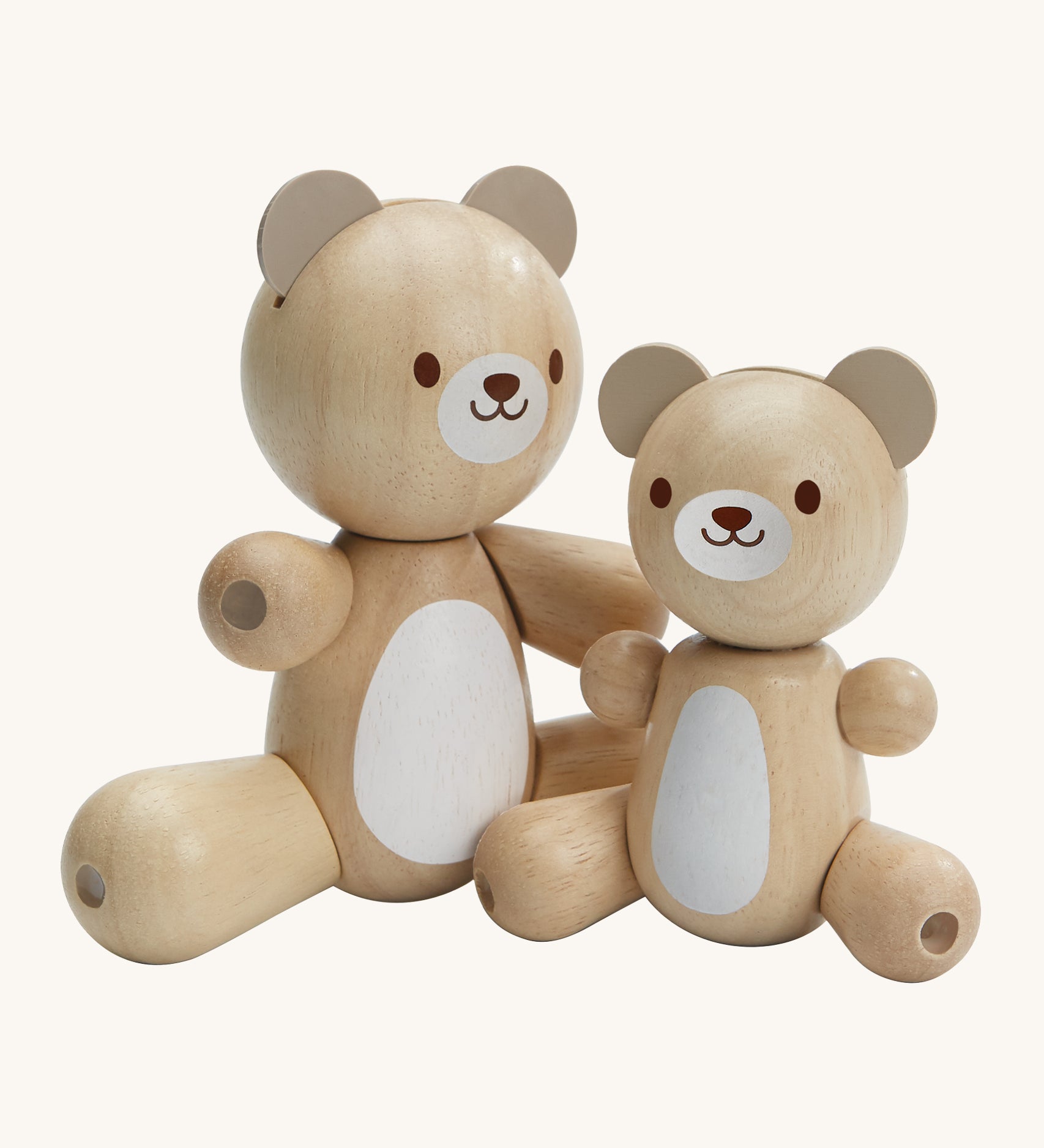 PlanToys Bear & Little Bear, is an adorable pair of bears made from wood, and perfect for babies and little ones. In this set is a big bear and a little bear, perfect for role play or play in general. Each bear has movable arms and legs, a white patch on their tummy and a happy, smiling face. The image is on a cream background