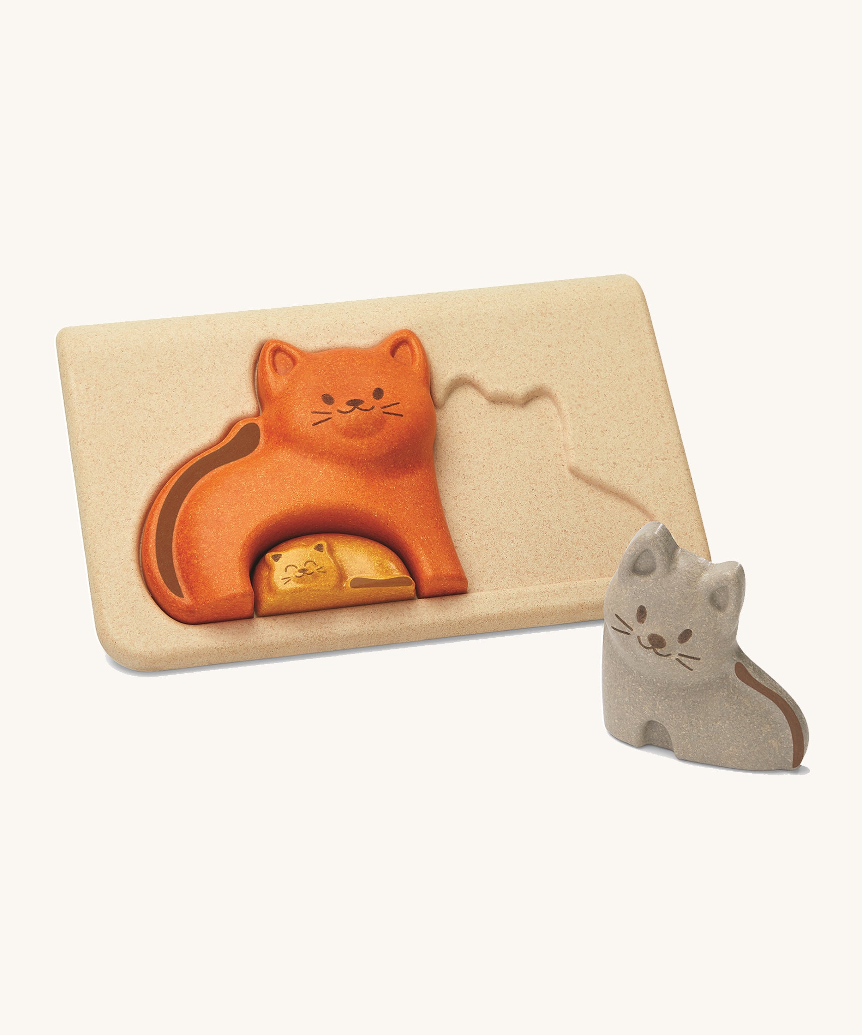 PlanToys Cat Puzzle is an adorable toy that comes with three cats, one grey, one orange and one yellow. Made from PlanWood, and with a light coloured puzzle board. This image is on a cream background