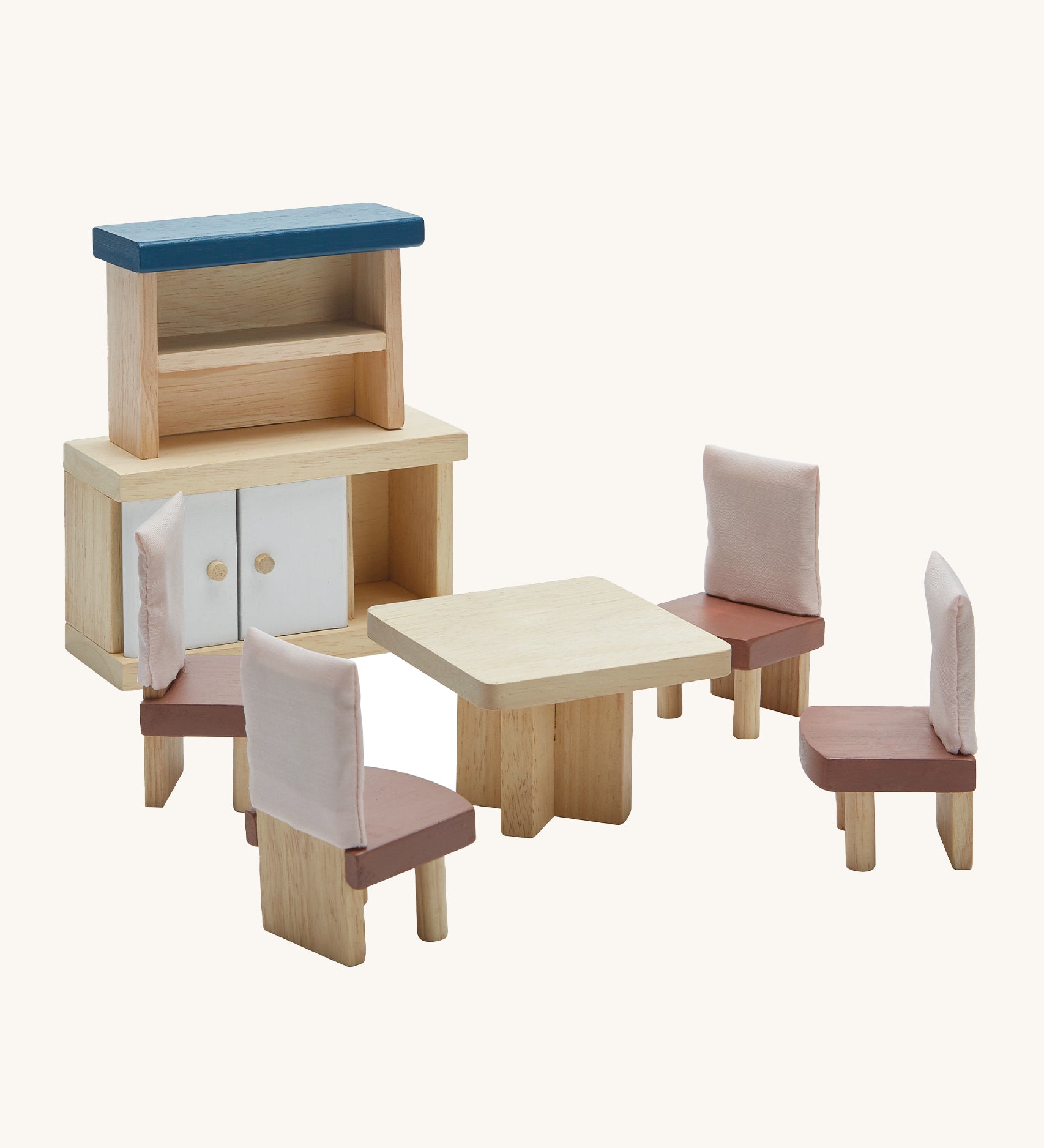 Plan Toys Dining Room Dolls House Furniture, features a table, 4 chairs and a side dresser. On a cream background