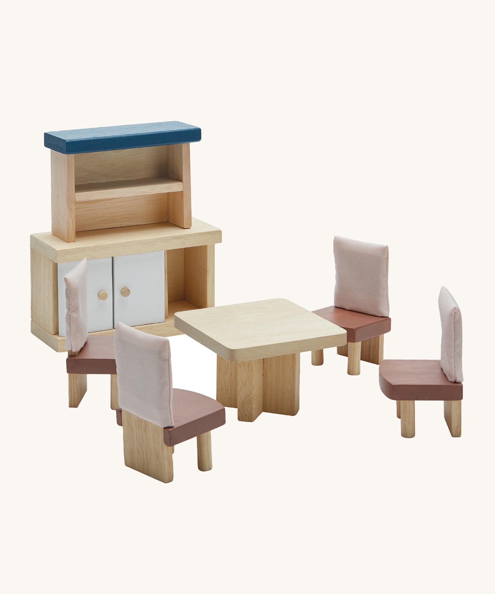 Plan Toys Dining Room Dolls House Furniture, features a table, 4 chairs and a side dresser. On a cream background