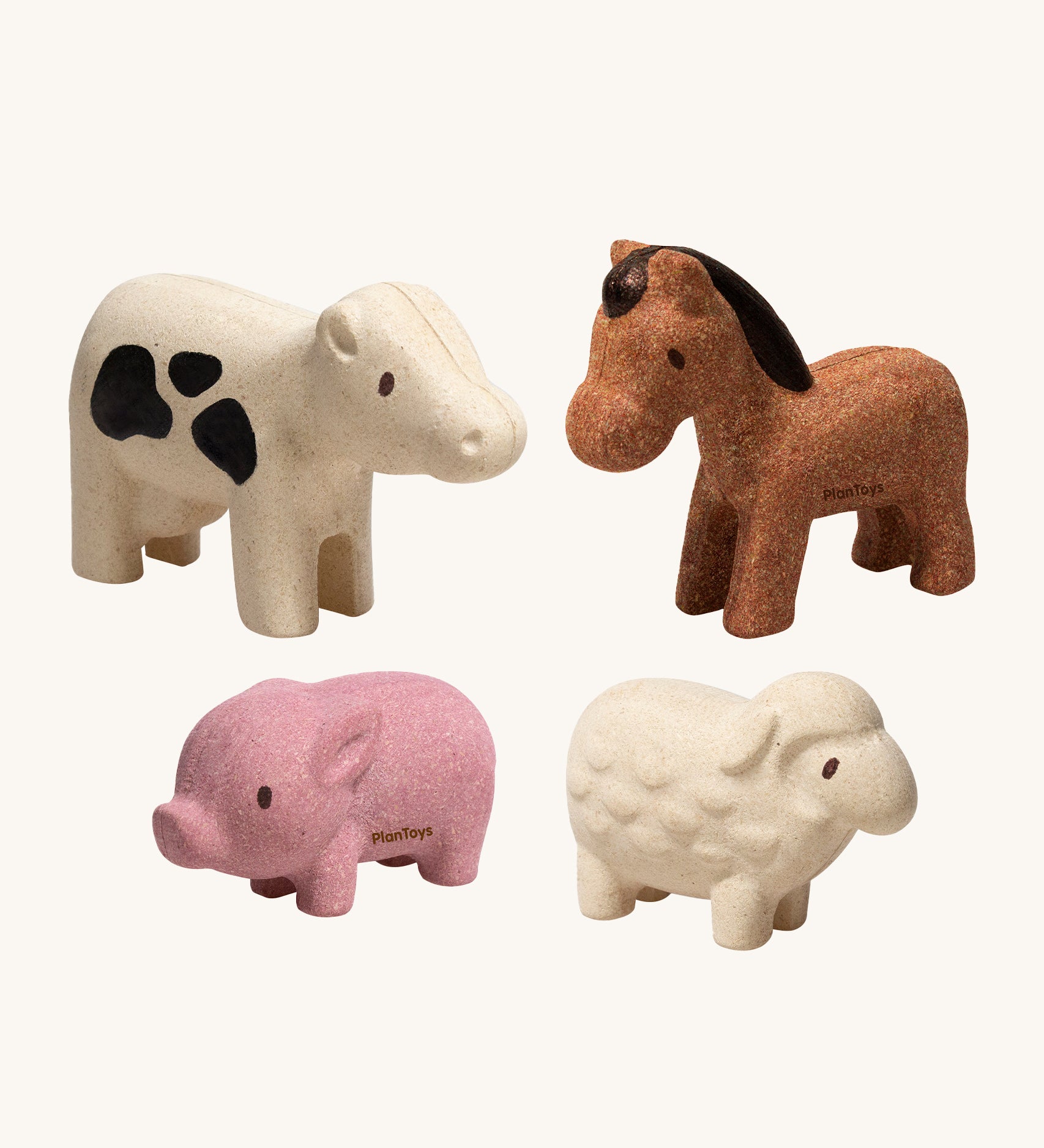 The PlanToys Farm Animals Set come with four adorable figures which include a pink pig, a white cow with black spots, a brown horse and a white sheep. The image is on a cream background